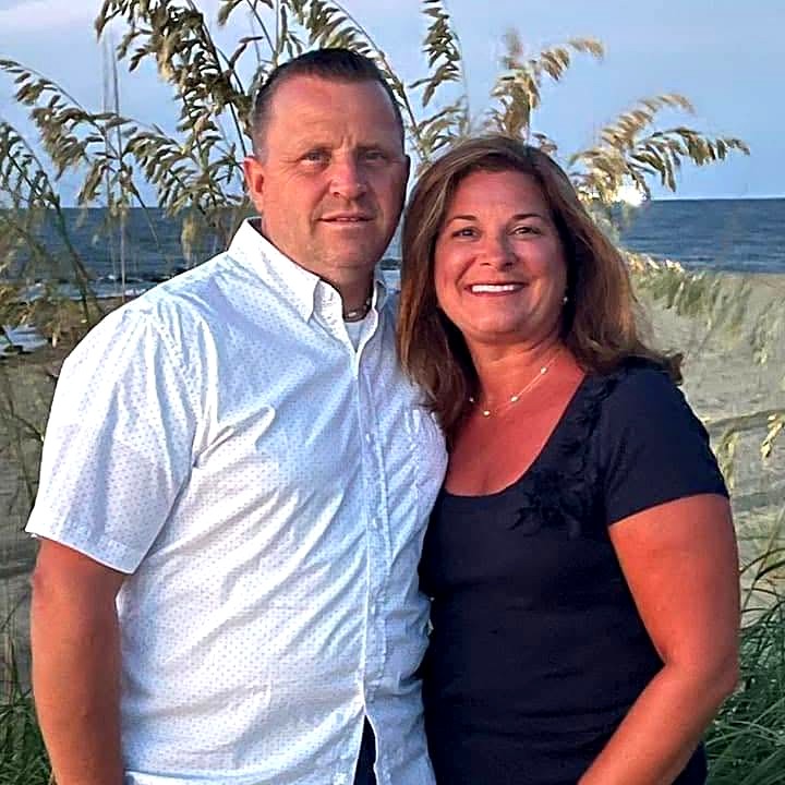 Diane and John, the owners of Ocean Pearl, on the beach in Myrtle Beach
